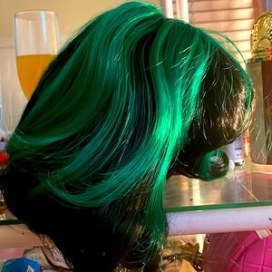 10 inch multi color wig. Best worn with purple makeup and red lipstick.